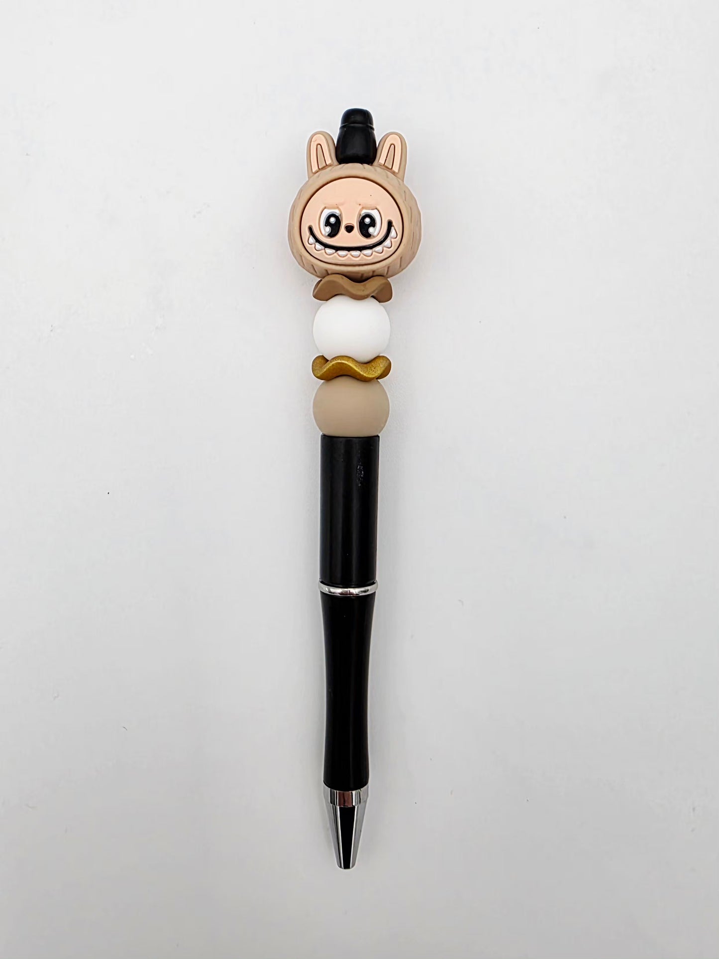 Brown labubu pen