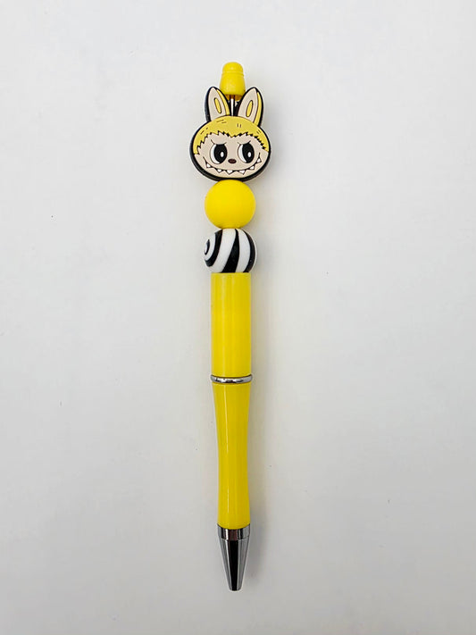Yellow labubu pen.